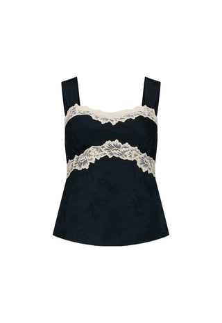 a-black-camisole-top-with-wide-shoulder-straps-featuring-a-textured-jacquard-fabric-and-a-double-band-of-cream-lace-trim-across-the-bust-and-waist-shown-against-a-plain-white-background